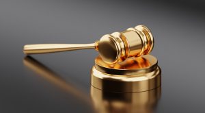 Trafford Business Owner Divorce Attorney Canva Golden Hammer and Gavel 300x165